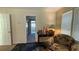 Comfortable living room area with an archway entrance and bright natural light at 5615 Oak Bend Dr, Las Vegas, NV 89135
