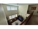 Two-story living room with plenty of natural light and comfortable seating areas at 5615 Oak Bend Dr, Las Vegas, NV 89135
