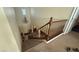 Carpeted staircase with wooden railing, leading to the upper level of the home at 5615 Oak Bend Dr, Las Vegas, NV 89135