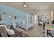 Nicely appointed bedroom featuring study area, lounge area, and a 4-poster bed at 5892 Castleberry Peak Ave, Las Vegas, NV 89131