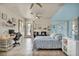 Nicely appointed bedroom featuring study area and a 4-poster bed at 5892 Castleberry Peak Ave, Las Vegas, NV 89131