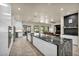 Spacious kitchen with large island, modern appliances, and ample counter space at 5892 Castleberry Peak Ave, Las Vegas, NV 89131