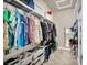 Well-organized walk-in closet features built-in shelving and hanging racks for ample storage space at 5892 Castleberry Peak Ave, Las Vegas, NV 89131