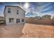 Large, open backyard space perfect for landscaping and outdoor entertaining, with a privacy wall at 6164 Violet Falls St # 44, North Las Vegas, NV 89081