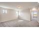 Carpeted bedroom with recessed lighting and natural light coming through the windows at 6164 Violet Falls St # 44, North Las Vegas, NV 89081