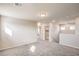 Spacious bonus room features carpeted floors, neutral paint, and recessed lights at 6164 Violet Falls St # 44, North Las Vegas, NV 89081