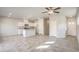 A bright and airy open floor plan with tile flooring and modern finishes at 6164 Violet Falls St # 44, North Las Vegas, NV 89081