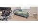 This bedroom has a single bed and sleek, modern computer setup at 6239 Milford Sound St, Las Vegas, NV 89148