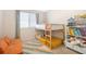 bedroom showcasing a bunk bed, colorful rug, and playful decor at 6239 Milford Sound St, Las Vegas, NV 89148