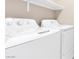 Clean laundry room features a white washer and dryer for convenient home chores at 6239 Milford Sound St, Las Vegas, NV 89148