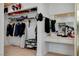 A well-organized closet with a built-in vanity offers ample storage space for clothing and accessories at 6304 Peppermill Dr, Las Vegas, NV 89146