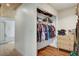Bright closet with wooden ceiling and trim, shelving, rod, and dresser at 6304 Peppermill Dr, Las Vegas, NV 89146