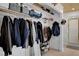 A spacious closet with shelves and hanging space for clothes and accessories provides ample storage at 6304 Peppermill Dr, Las Vegas, NV 89146