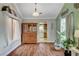 Cozy dining room with vintage hutch and view of kitchen at 6304 Peppermill Dr, Las Vegas, NV 89146