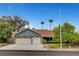Charming single-story home featuring a spacious two-car garage and well-maintained landscaping at 6304 Peppermill Dr, Las Vegas, NV 89146