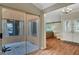 Bright living room showcasing wood floors, sliding glass doors and natural light at 6304 Peppermill Dr, Las Vegas, NV 89146