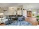 Open-concept living room features stylish decor and wood flooring at 6304 Peppermill Dr, Las Vegas, NV 89146