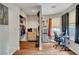 Dual-purpose office/closet with wood floors, natural light, and closet storage at 6304 Peppermill Dr, Las Vegas, NV 89146