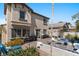 Backyard offers outdoor seating, a fire pit, an outdoor kitchen, and well-maintained landscaping at 6620 Macdoogle St, Las Vegas, NV 89166