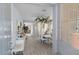 Bright entryway leads to dining area with lots of natural light and an open-concept layout at 6620 Macdoogle St, Las Vegas, NV 89166