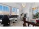 A bright home office with natural light, featuring a large window and modern decor at 6620 Macdoogle St, Las Vegas, NV 89166