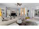 Inviting living room with contemporary decor and a comfortable seating arrangement perfect for relaxation at 6620 Macdoogle St, Las Vegas, NV 89166