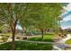 Beautiful community area with lush landscaping, walkways, and a playground for residents to enjoy at 6650 W Warm Springs Rd # 2173, Las Vegas, NV 89118