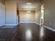 Inviting living room featuring hardwood floors and neutral paint scheme, ready for your personal touch at 6650 W Warm Springs Rd # 2173, Las Vegas, NV 89118