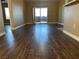 Bright living room featuring sliding glass doors to a patio, perfect for indoor-outdoor living at 6650 W Warm Springs Rd # 2173, Las Vegas, NV 89118