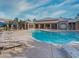 Large community pool with plenty of lounge chairs and shade, perfect for entertaining and relaxation at 6650 W Warm Springs Rd # 2173, Las Vegas, NV 89118