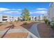Residential buildings featuring well maintained landscaping, mature trees and sidewalks at 6800 E Lake Mead Blvd # 2050, Las Vegas, NV 89156