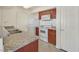 Functional kitchen with granite countertops, white appliances, and ample storage at 6800 E Lake Mead Blvd # 2050, Las Vegas, NV 89156