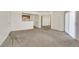 Large living room area with carpet, perfect for comfortable living and gatherings at 6800 E Lake Mead Blvd # 2050, Las Vegas, NV 89156