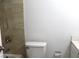 Bathroom featuring the toilet and a shower/tub at 7170 Mountain Moss Dr, Las Vegas, NV 89147