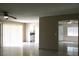 Bright, open layout connecting the living area, kitchen and dining space at 7170 Mountain Moss Dr, Las Vegas, NV 89147