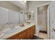 Spacious bathroom with dual sinks and a separate toilet area at 7181 Barton Creek Ct, Las Vegas, NV 89113