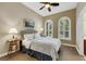 Bedroom with hard wood floors and lots of natural light at 7181 Barton Creek Ct, Las Vegas, NV 89113