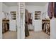 Spacious walk-in closet with custom shelving and ample storage space at 7181 Barton Creek Ct, Las Vegas, NV 89113