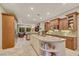 Bright kitchen featuring a large island with seating and open layout at 7181 Barton Creek Ct, Las Vegas, NV 89113