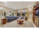 Inviting living room with natural light, plush seating, and decorative accents at 7181 Barton Creek Ct, Las Vegas, NV 89113