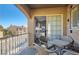 Cozy balcony with outdoor seating offering views of the surrounding neighborhood at 7250 Diamond Canyon Ln # 204, Las Vegas, NV 89149