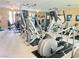 Community gym with various exercise machines and wall mirror at 7450 S Eastern Ave # 1059, Las Vegas, NV 89123