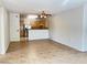 Open-concept living area with ceramic tile and access to the kitchen at 7450 S Eastern Ave # 1059, Las Vegas, NV 89123