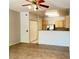 Open concept floor plan featuring a ceiling fan and direct kitchen access at 7450 S Eastern Ave # 1059, Las Vegas, NV 89123