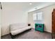 Bedroom with futon and bright window for natural light at 7605 Moore Creek Ln, North Las Vegas, NV 89084