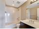 This bathroom features a shower-tub combo, modern sink and vanity at 8255 Las Vegas Blvd # 1315, Las Vegas, NV 89123