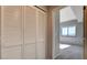 Bedroom entrance with closet featuring bi-fold doors and stunning views at 8255 Las Vegas Blvd # 1315, Las Vegas, NV 89123