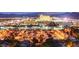 Spectacular aerial night view of city skyline with twinkling lights and mountain landscape at 8255 Las Vegas Blvd # 1315, Las Vegas, NV 89123