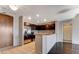 Contemporary condo kitchen with stainless steel appliances, granite counters and dark wood cabinets at 8255 Las Vegas Blvd # 1315, Las Vegas, NV 89123