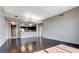 Open floor plan showcasing the hardwood floors and flowing seamlessly into the stylish modern kitchen at 8255 Las Vegas Blvd # 1315, Las Vegas, NV 89123